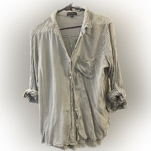 Loose fit button down. Soft and light fabric. Gently worn.